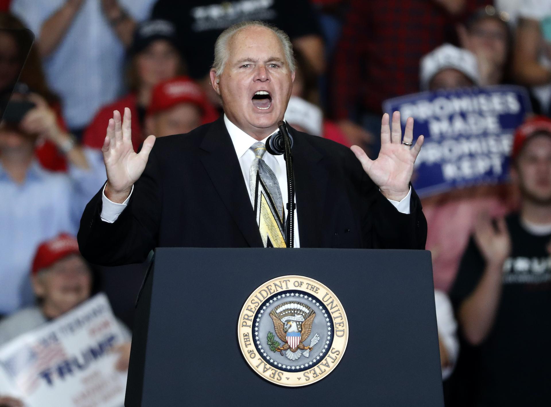 This Nov. 5, 2018 file photo shows radio personality Rush Limbaugh introducing President Donald Trump at the start of a campaign rally in Cape Girardeau, Mo. (AP Photo / Jeff Roberson, File)