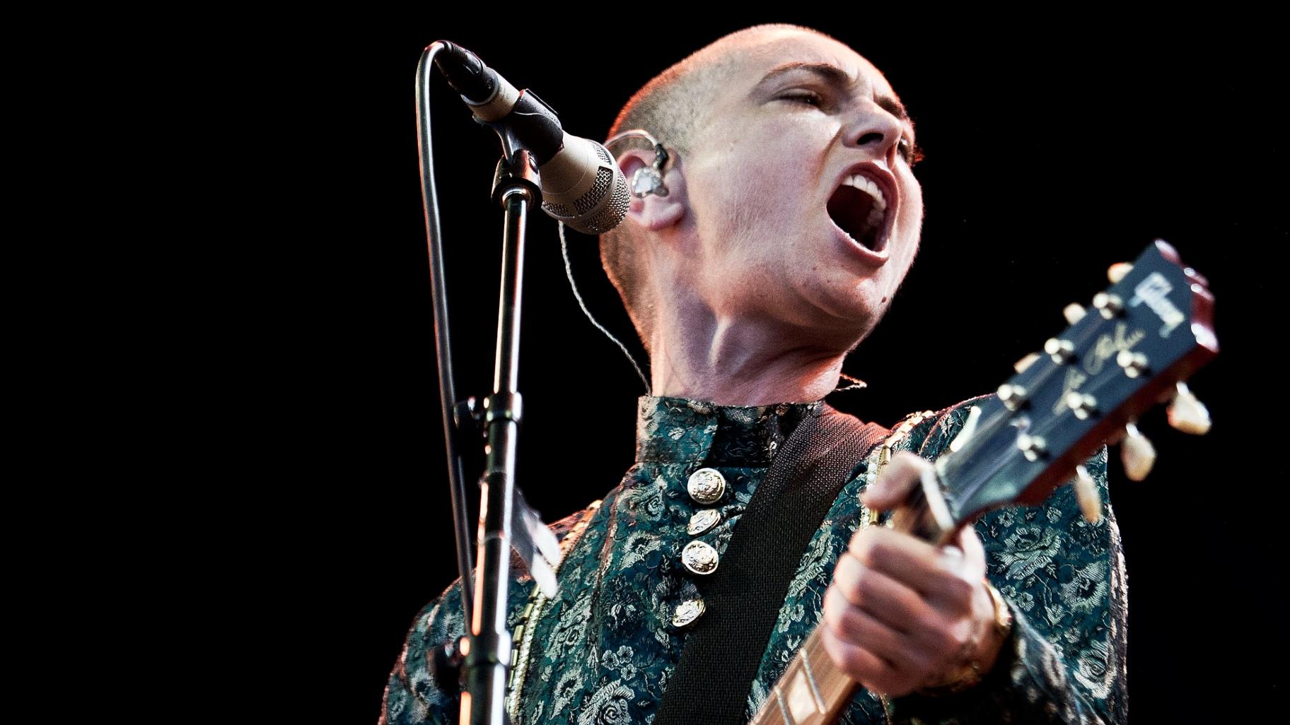 FILE - Irish singer-songwriter Sinéad O'Connor in concert on the first night of the Toender Folk Music Festival in Toender, on the south western part of Denmark on Aug. 23, 2013. (AP Photo / Casper Dalhoff, Polfoto, File)