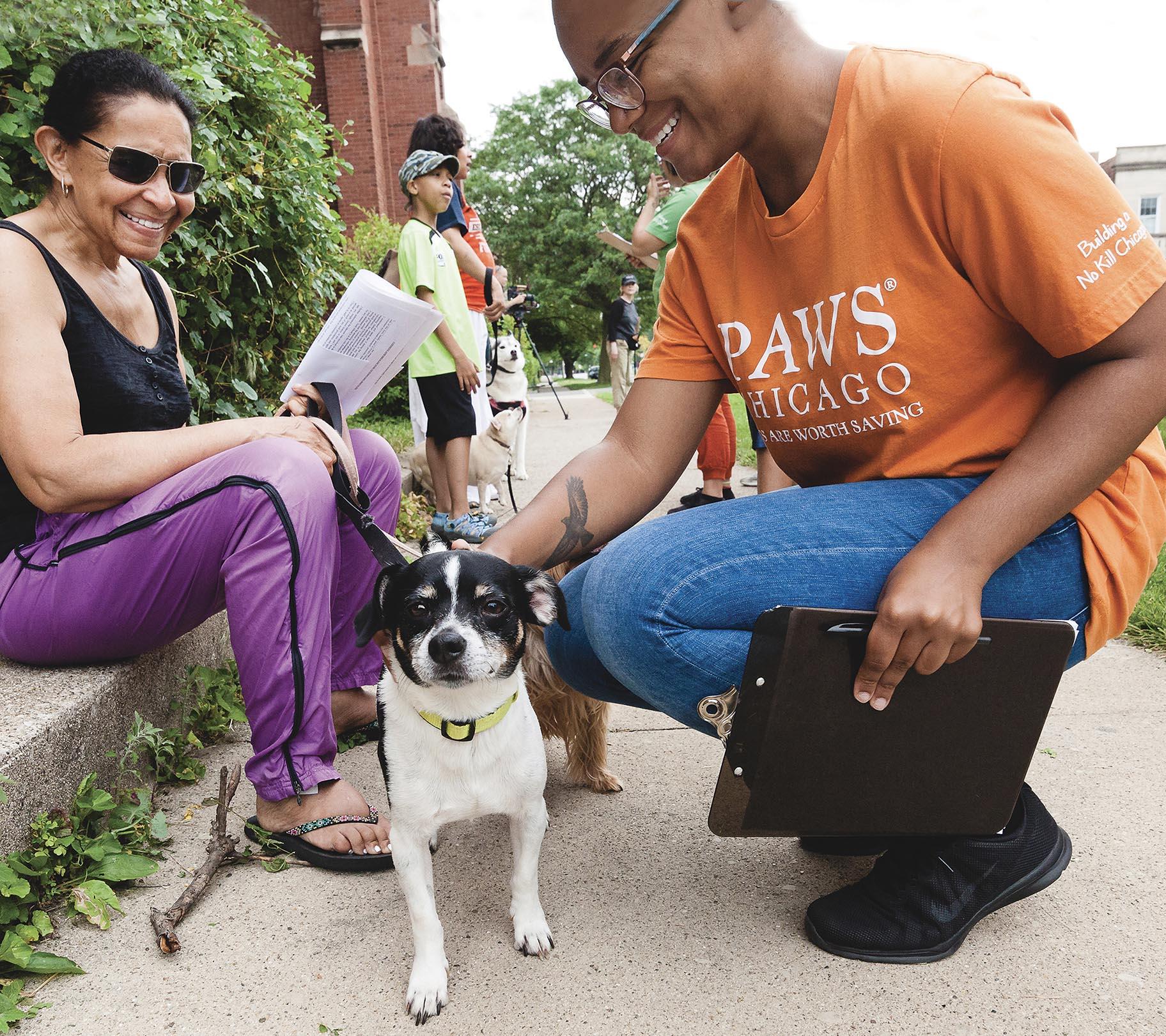 Since 2014, PAWS Chicago has operated a door-to-door outreach program aimed at reaching areas of the city with the highest rates of homeless pets. (Courtesy PAWS Chicago) 