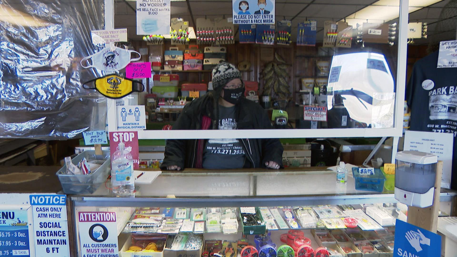 Stacey Greene stands behind the counter of the Park Bait Shop on Mar. 12, 2020. The shop located near Montrose Harbor was opened more than 60 years ago by Greene’s father Willie Greene. (WTTW News)