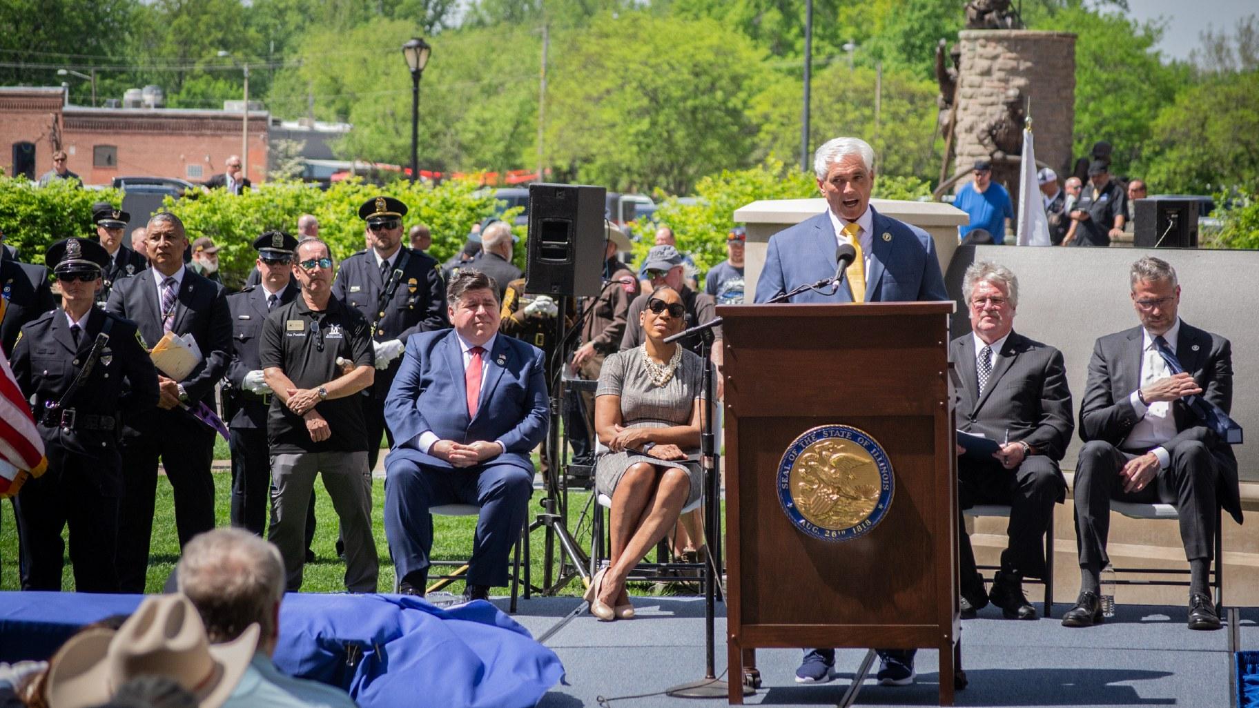Retired Chicago police officer Mike Ostrowski speaks to the crowd at the annual Police Officers Memorial in Springfield on Thursday, May 2, 2024. (Jerry Nowicki / Capitol News Illinois)