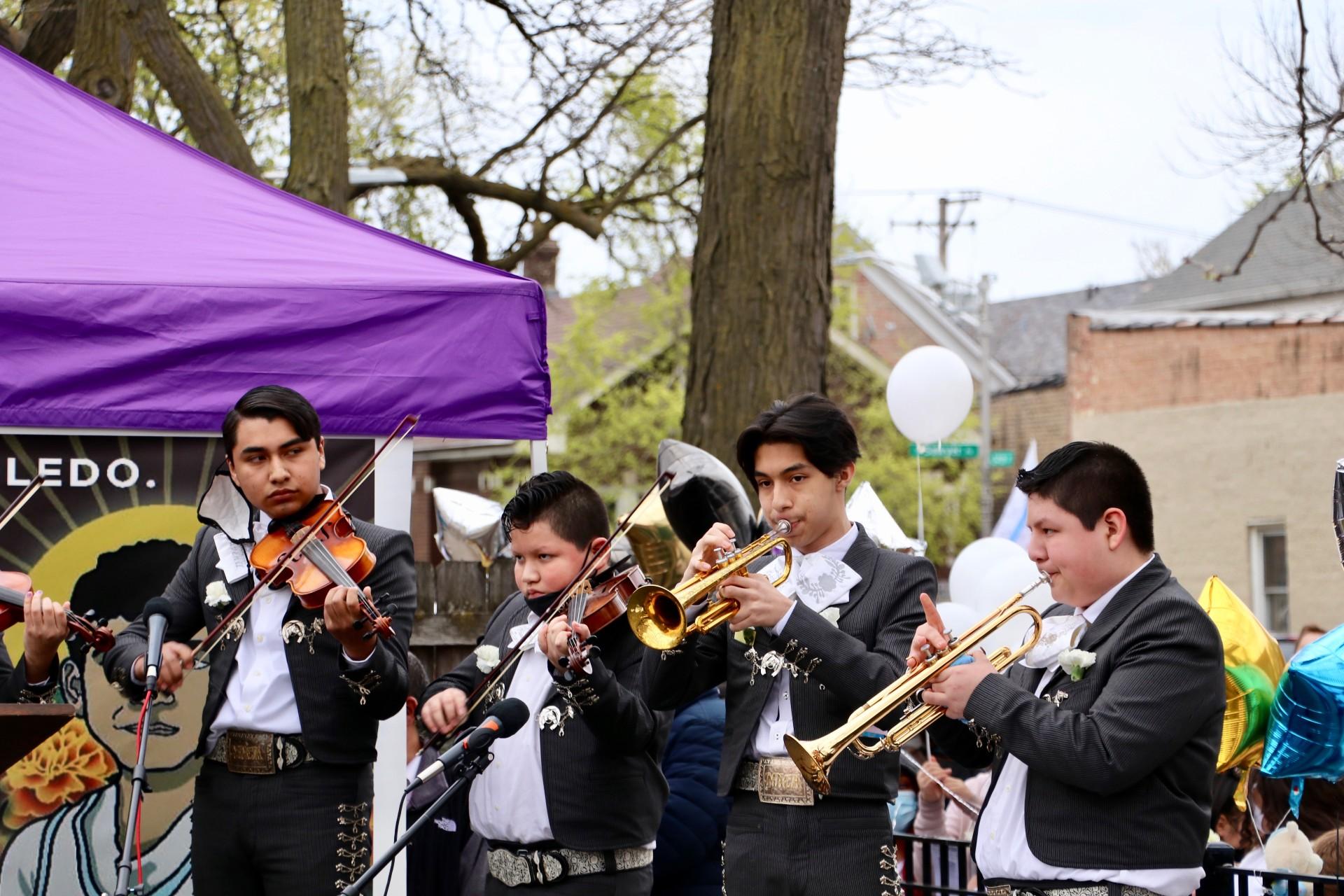 A mariachi band performs April 18, 2021 during a peace walk organized in Little Village, a predominantly Latino community on Chicago’s West Side. (Evan Garcia / WTTW News)
