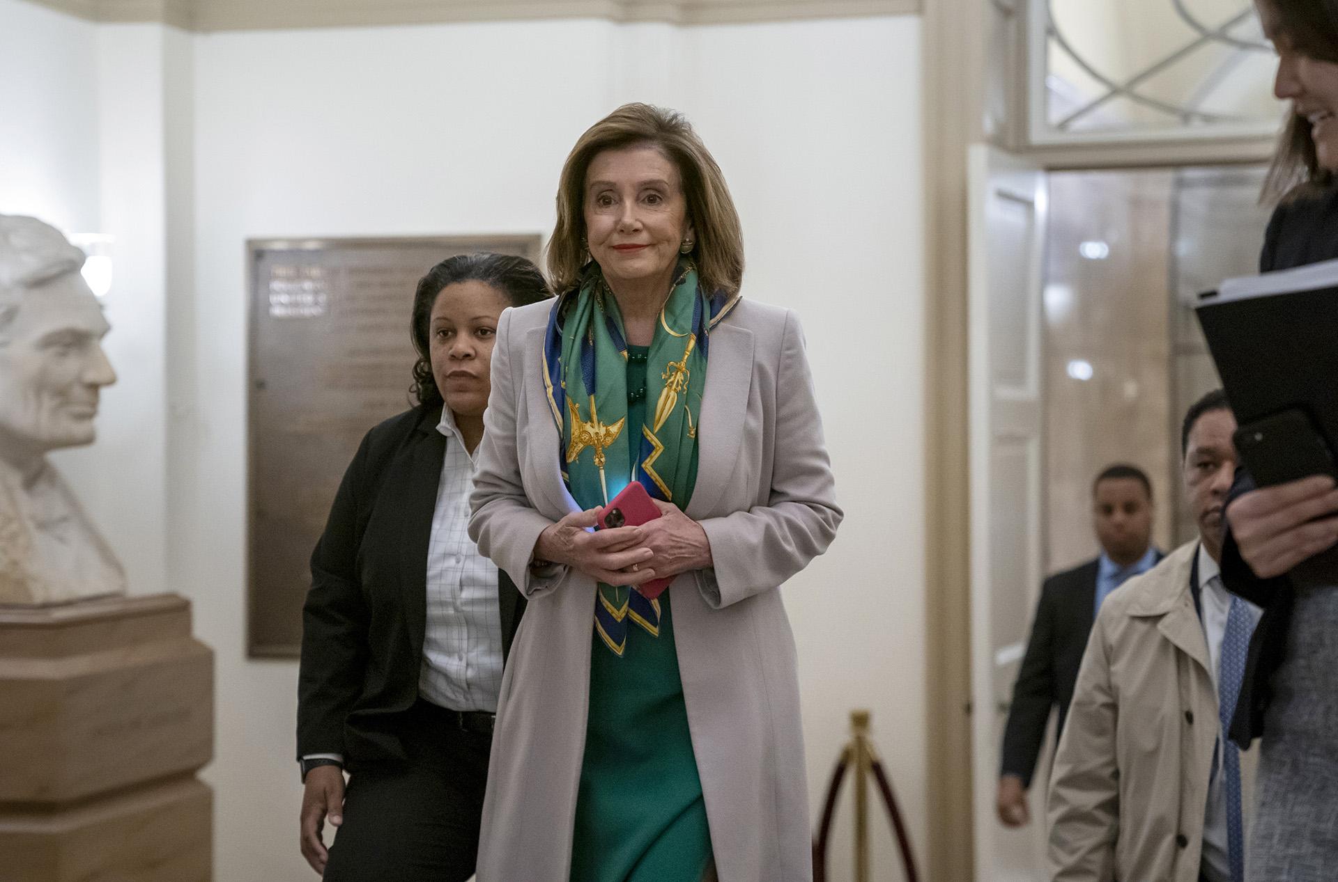 Speaker of the House Nancy Pelosi, D-Calif., arrives to meet with the Democratic Caucus at the Capitol in Washington, Tuesday, Jan. 14, 2020. (AP Photo / J. Scott Applewhite)