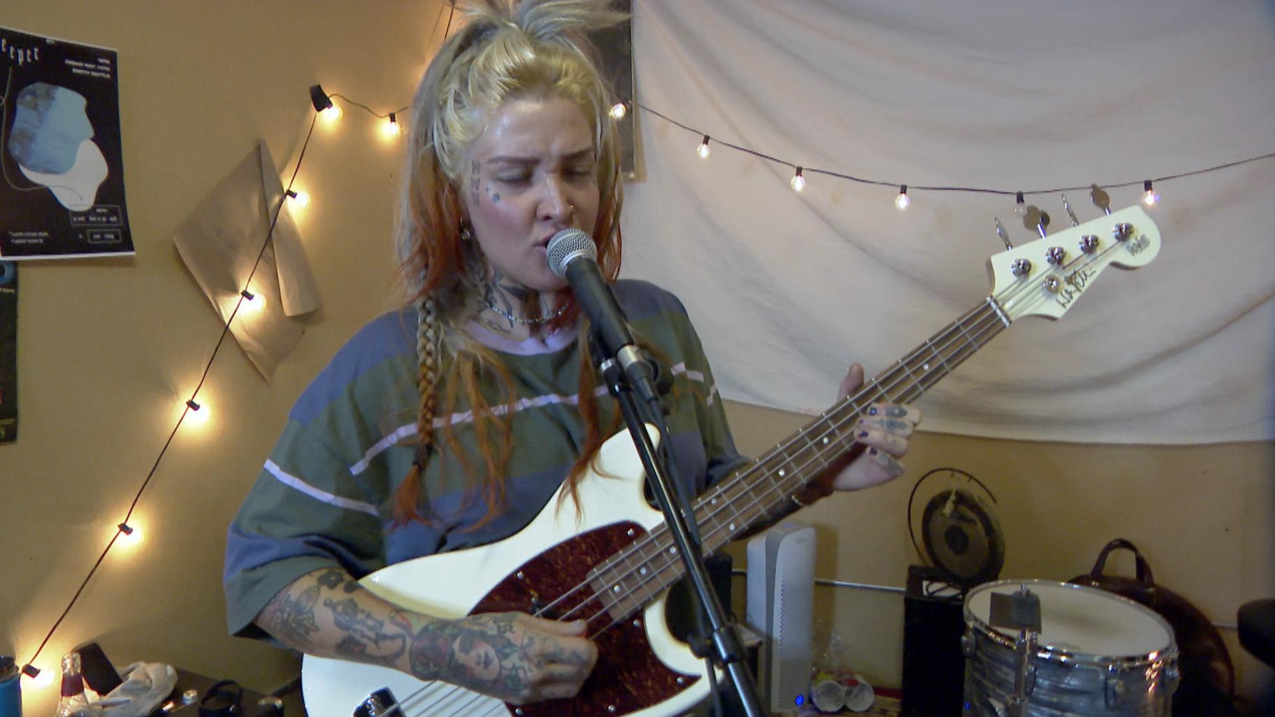 “I just want people to feel. I’ve always tried to write music that either encourages people to cry or laugh or feel uninhibited because that’s how I feel most of the time,” Emily Kempf said. (WTTW News)  