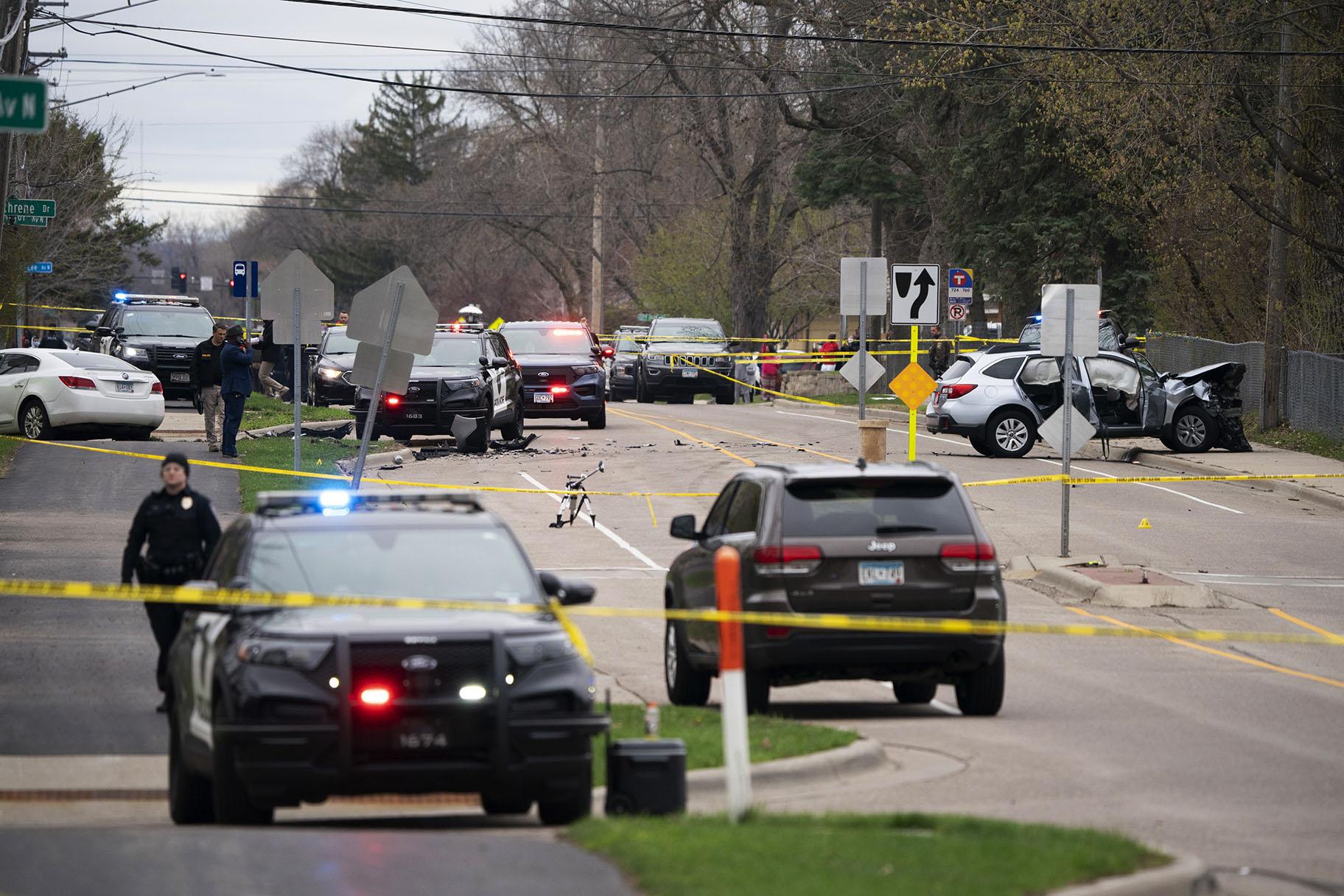 Authorities work the scene at the site of a shooting involving a police officer, Sunday, April 11, 2021, in Brooklyn Center, Minn. (Jeff Wheeler / Star Tribune via AP)