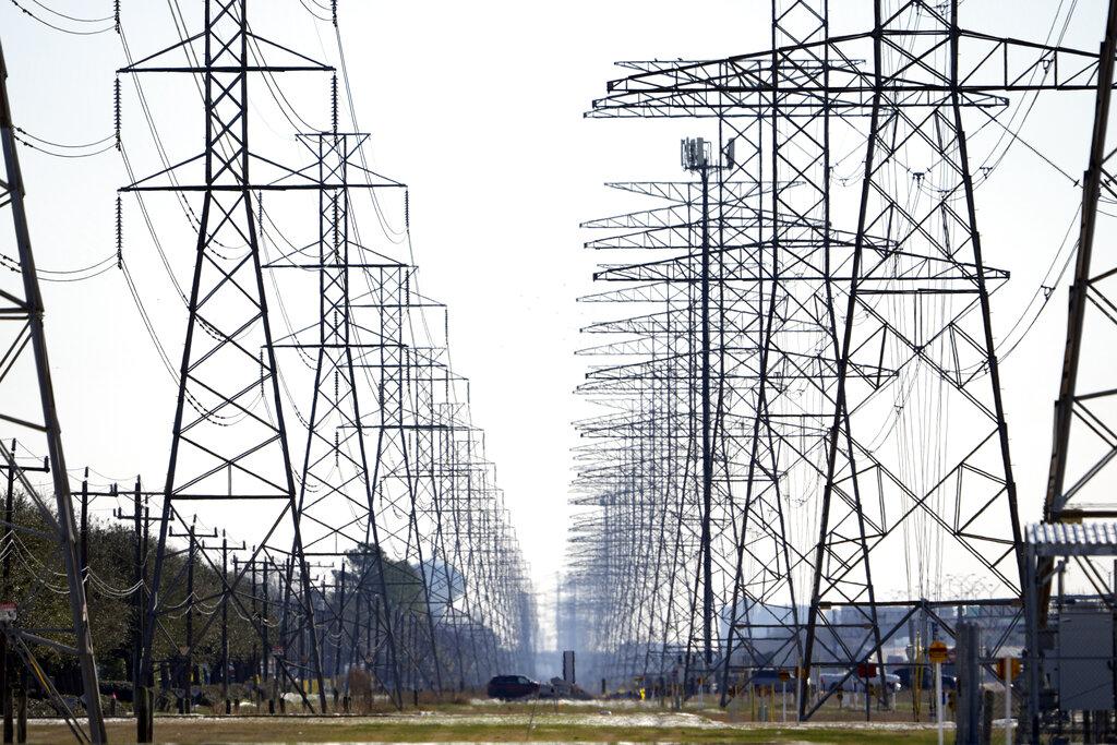 This Tuesday, Feb. 16, 2021 file photo shows power lines in Houston. (AP Photo / David J. Phillip, File)