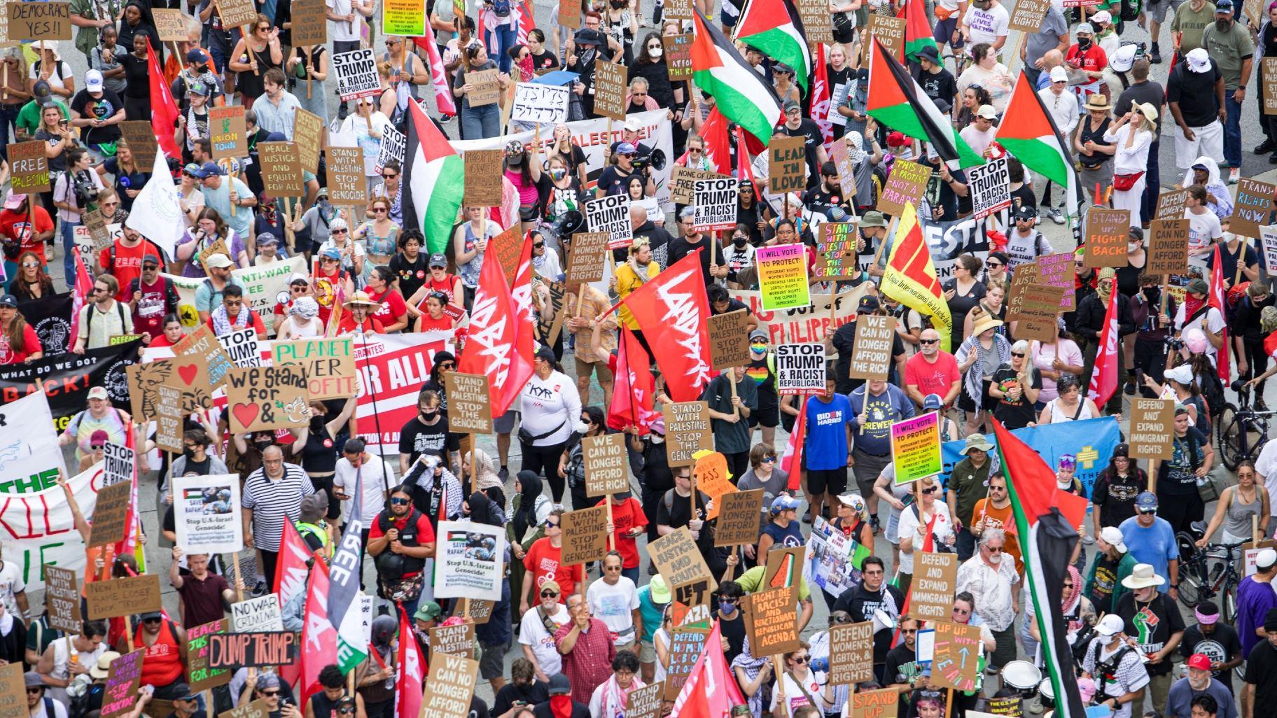 A sea of protesters gathers on the streets of downtown Milwaukee on Monday, July 15, 2024, for a protest coordinated by The Coalition to March on the RNC 2024. (Michael Izquierdo / WTTW News)