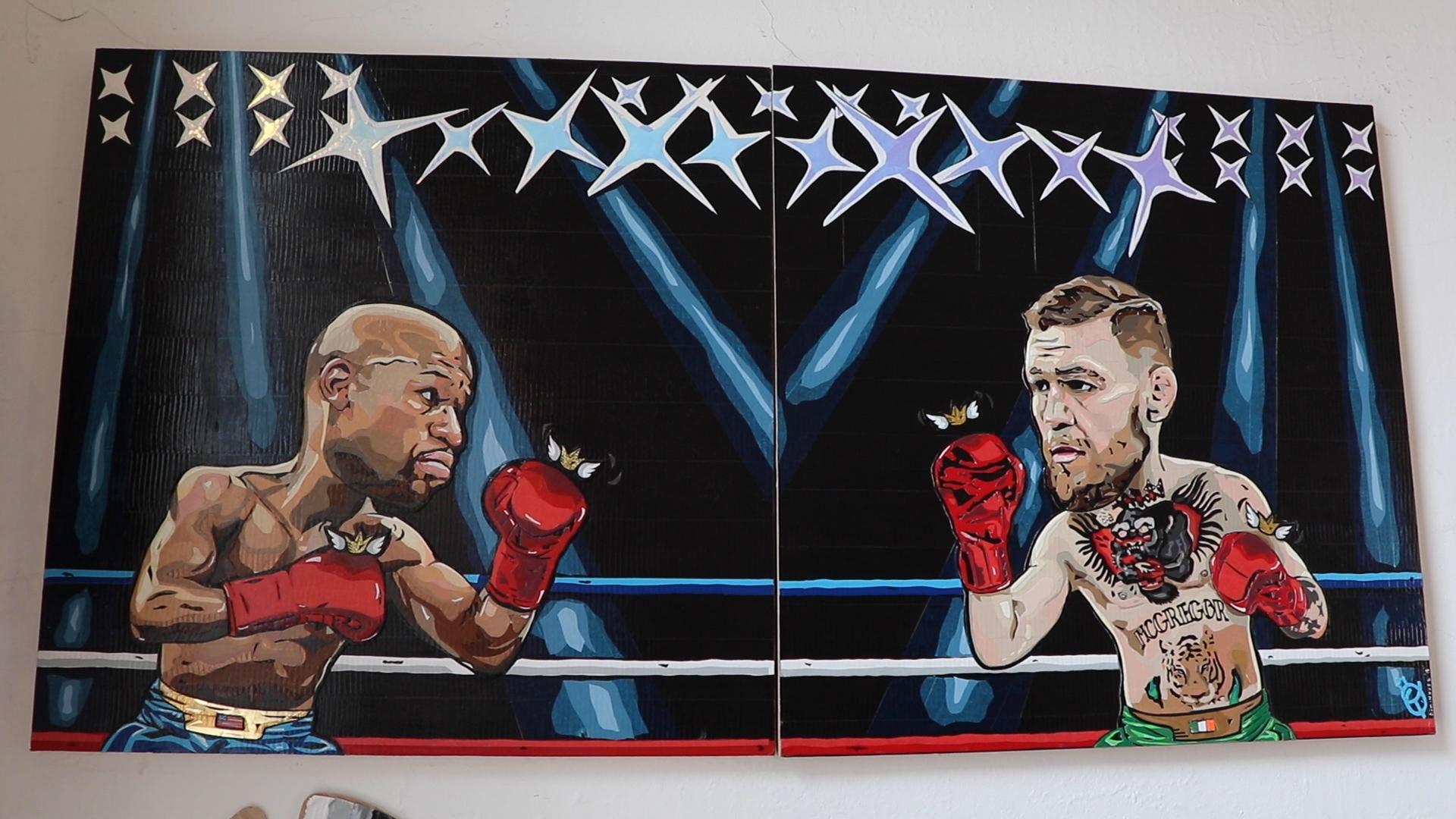 Artist and sports fan Anna Dominguez taped together this depiction of the August 2017 boxing match between Floyd Mayweather Jr. and Conor McGregor. (Evan Garcia / WTTW News)