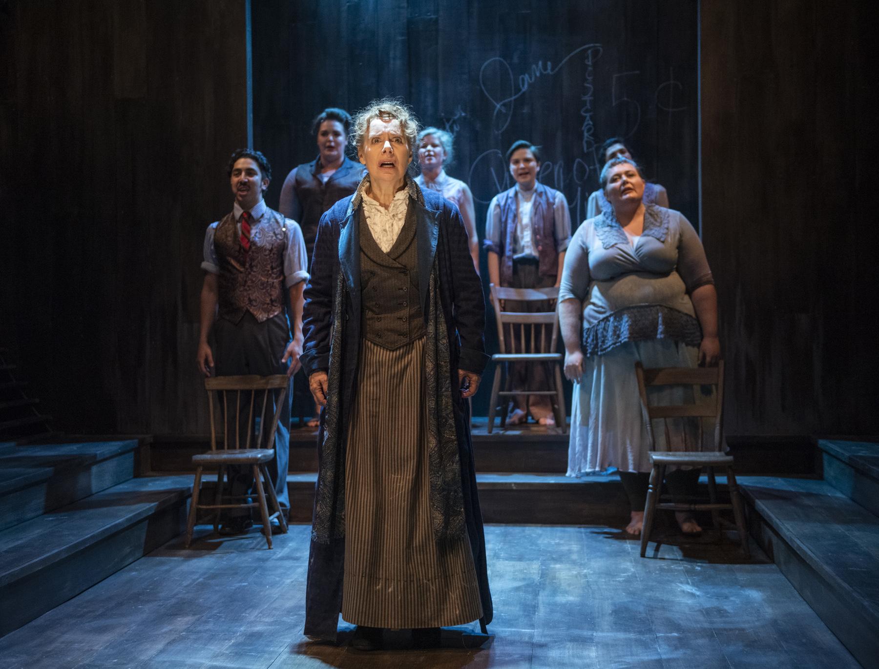 Barbara E. Robertson, center, with, from left, Max J. Cervantes, Neala Barron, Liz Chidester, Hannah Starr, Liz Bollar and Maryam Abdi in Firebrand Theatre’s Chicago premiere of “Queen of the Mist.” (Photo by Michael Brosilow)