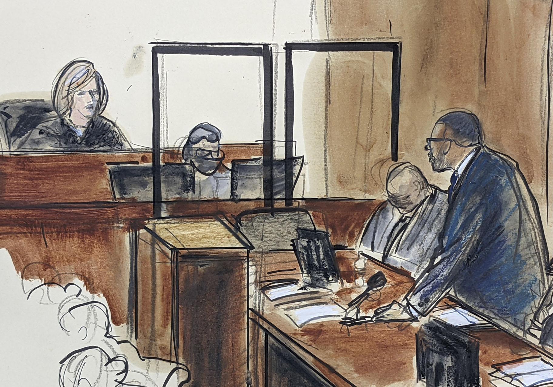 In this illustration drawn from a video feed, R. Kelly, right, stands and responds to Judge Ann Donnelly’s question whether or not he has decided to take the stand in his own defense, Wednesday, Sept. 22, 2021, in New York. (AP Photo / Elizabeth Williams)