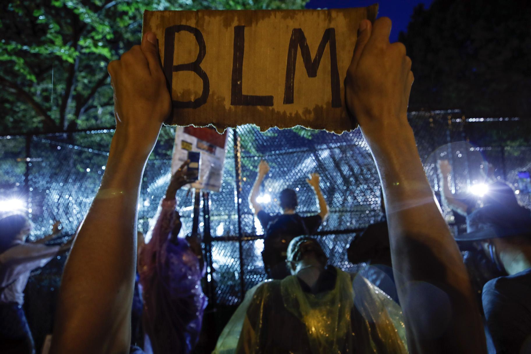 In this June 4, 2020, file photo, demonstrators protest near the White House in Washington, over the death of George Floyd, a black man who was in police custody in Minneapolis. (AP Photo / Alex Brandon, File)