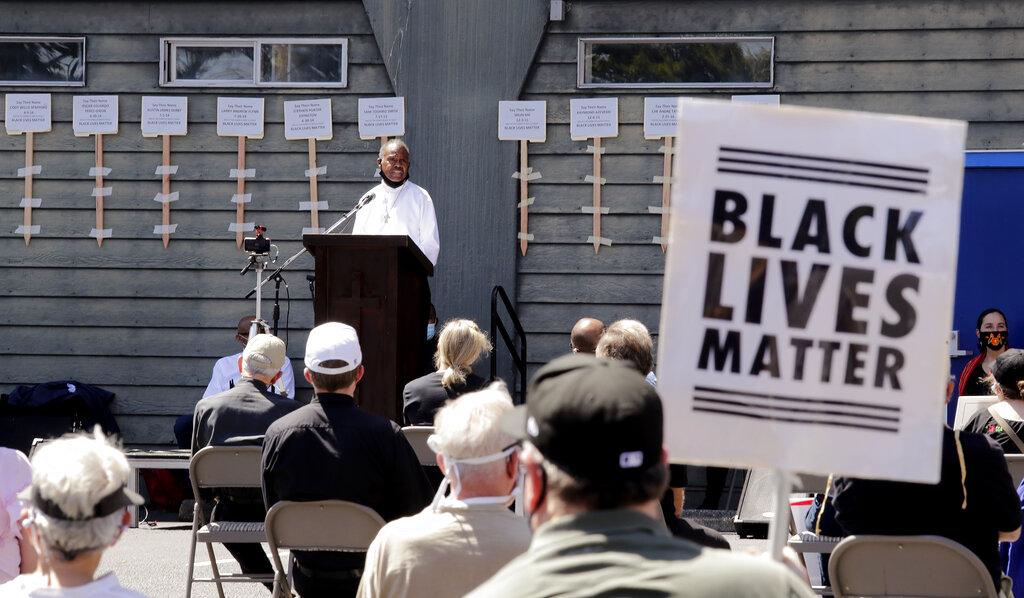 Deacon Joseph Conner speaks at an outdoor prayer vigil for racial justice at Immaculate Conception Catholic Church Sunday, July 19, 2020, in Seattle. (AP Photo / Elaine Thompson)