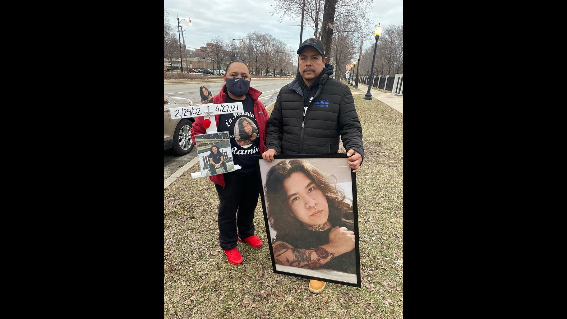 Ramiro Morales holds a portrait of his son, Ramiro Morales Jr., who was shot and killed in April 2021. The case remains unsolved. (Joanna Hernandez / WTTW News)