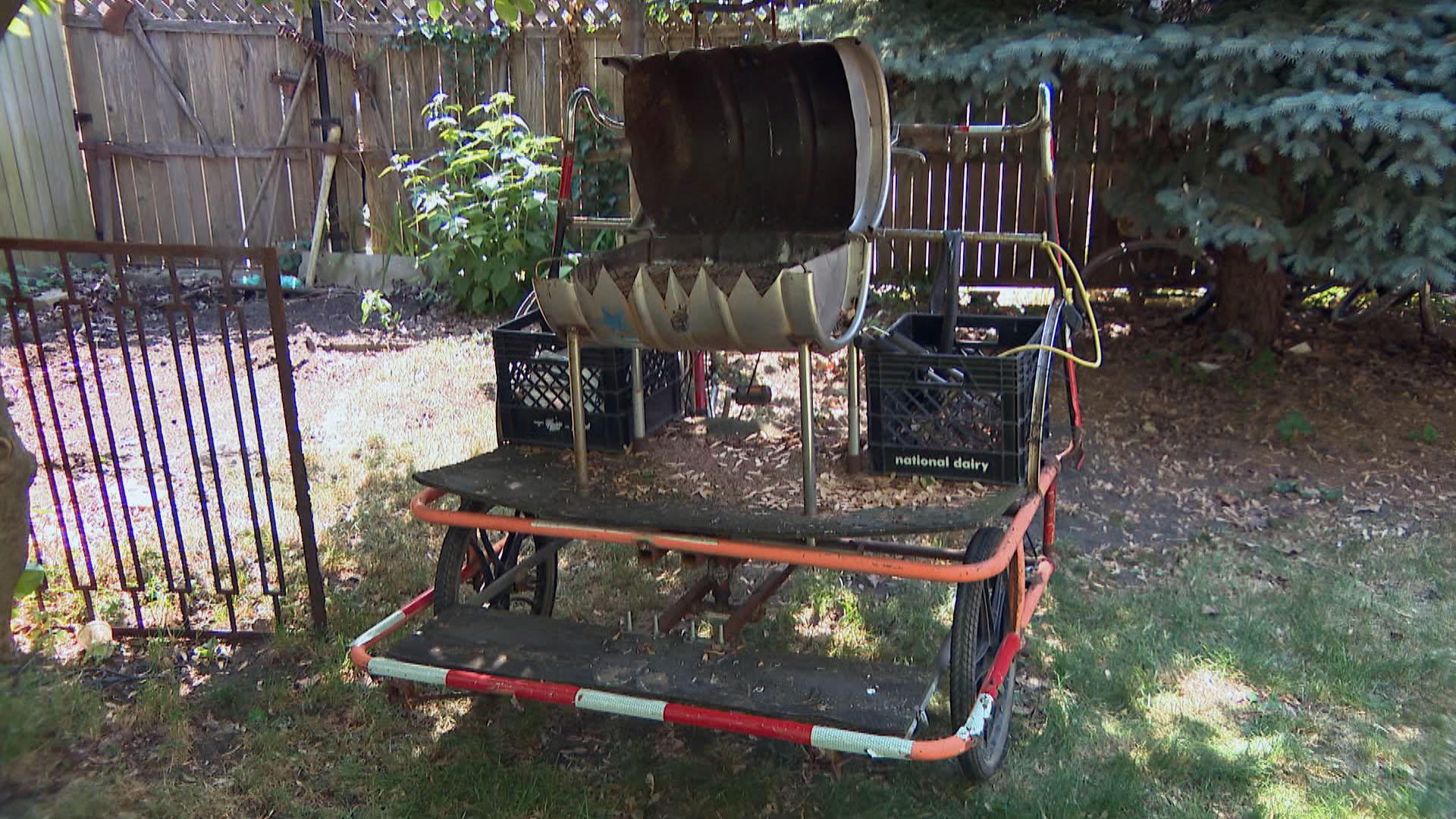 Cris Castellan’s “grill bike” is parked in his Logan Square backyard on June 11. The grill is a recycled beer keg. (WTTW News)