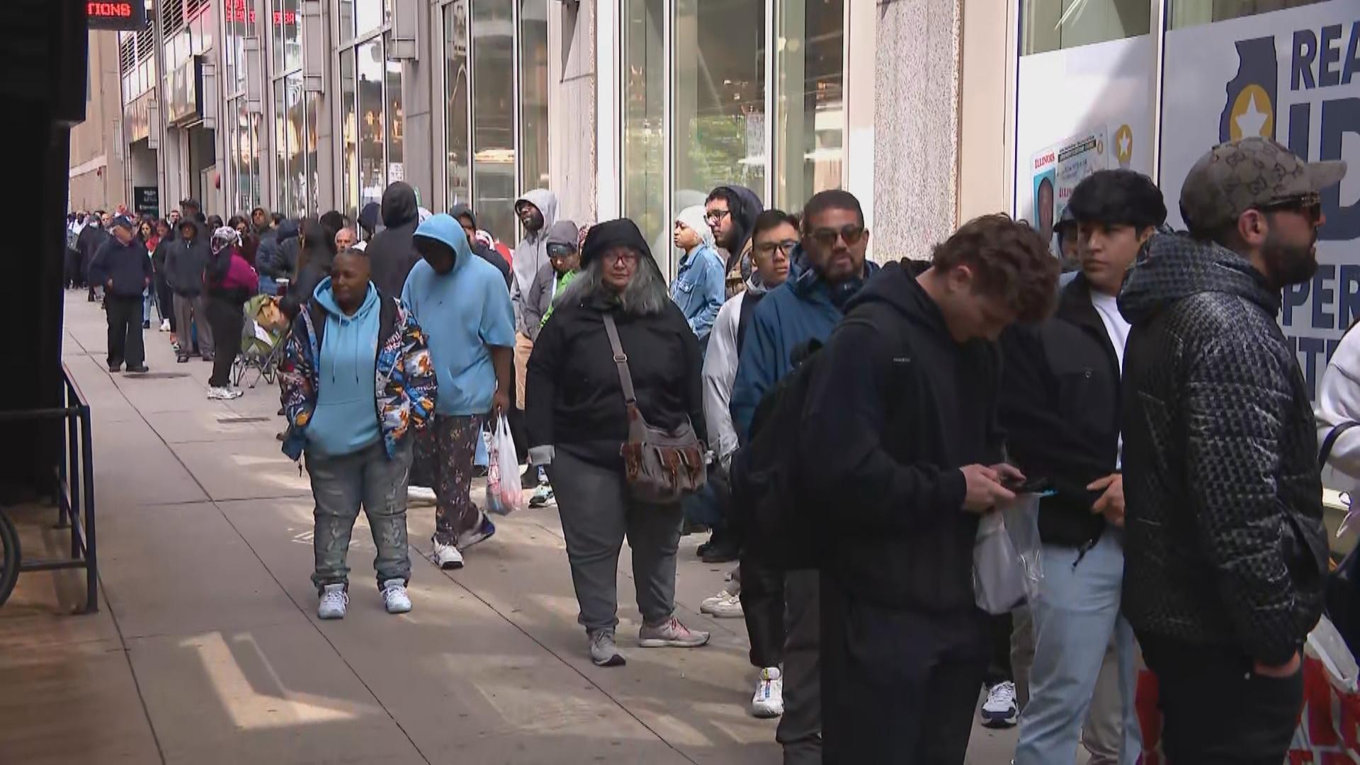 A long line forms outside of the Secretary of State's Chicago Supercenter. (WTTW News)