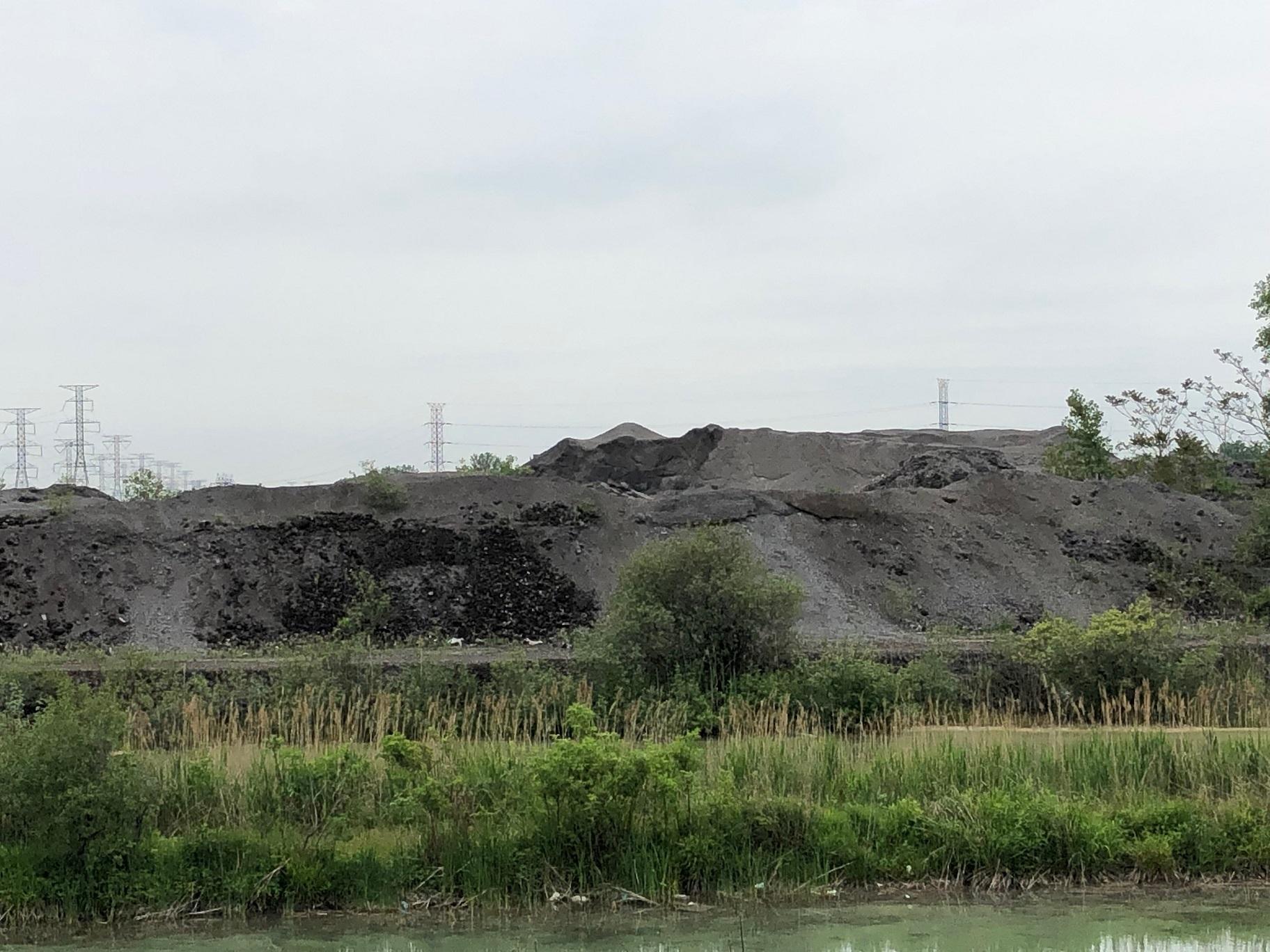 Piles of slag at the 67-acre Southeast Side property formerly used by Republic Steel. (Alex Ruppenthal / WTTW News)