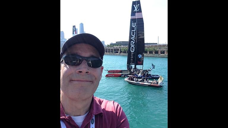 Geoffrey Baer snaps a selfie at the America's Cup World Series practice races on Friday at Navy Pier.