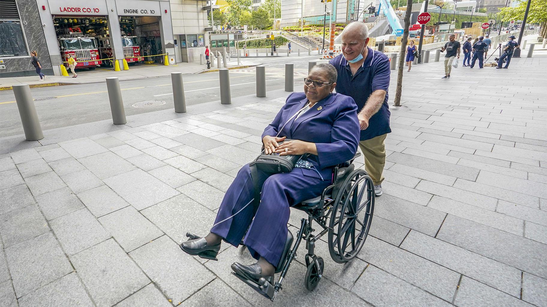 Retired NYPD Detective Barbara Burnette, left, who worked on the World Trade Center pile for 23 days after the terrorist attacks, and her husband Lebro Burnette walk away from the 9/11 Memorial & Museum, Wednesday, Sept. 8, 2021, in New York. (AP Photo / Mary Altaffer) 