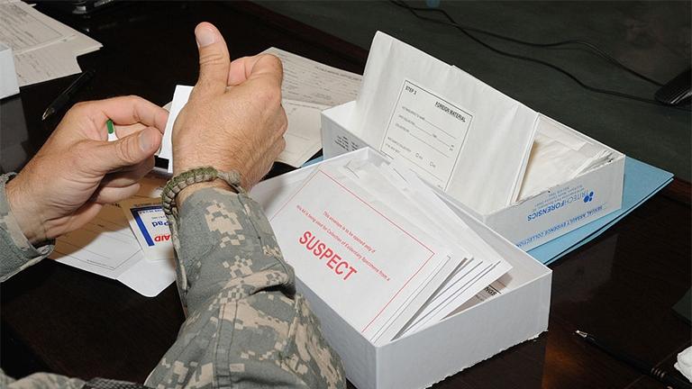 Medical professionals learn how to use the Sexual Assault Evidence Collection kit, which has several packets to collect evidence from a suspect and a patient of a sexual assault case. (Sgt. Rebecca Linder / Wikimedia Commons)