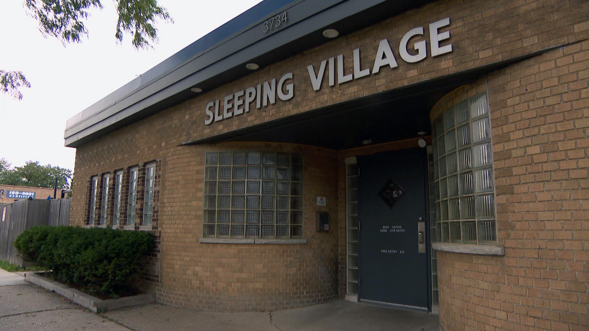 Sleeping Village, a bar, restaurant and music venue on Belmont, is one of several making it a policy that customers who enter must be masked and show proof of vaccination. (WTTW News)