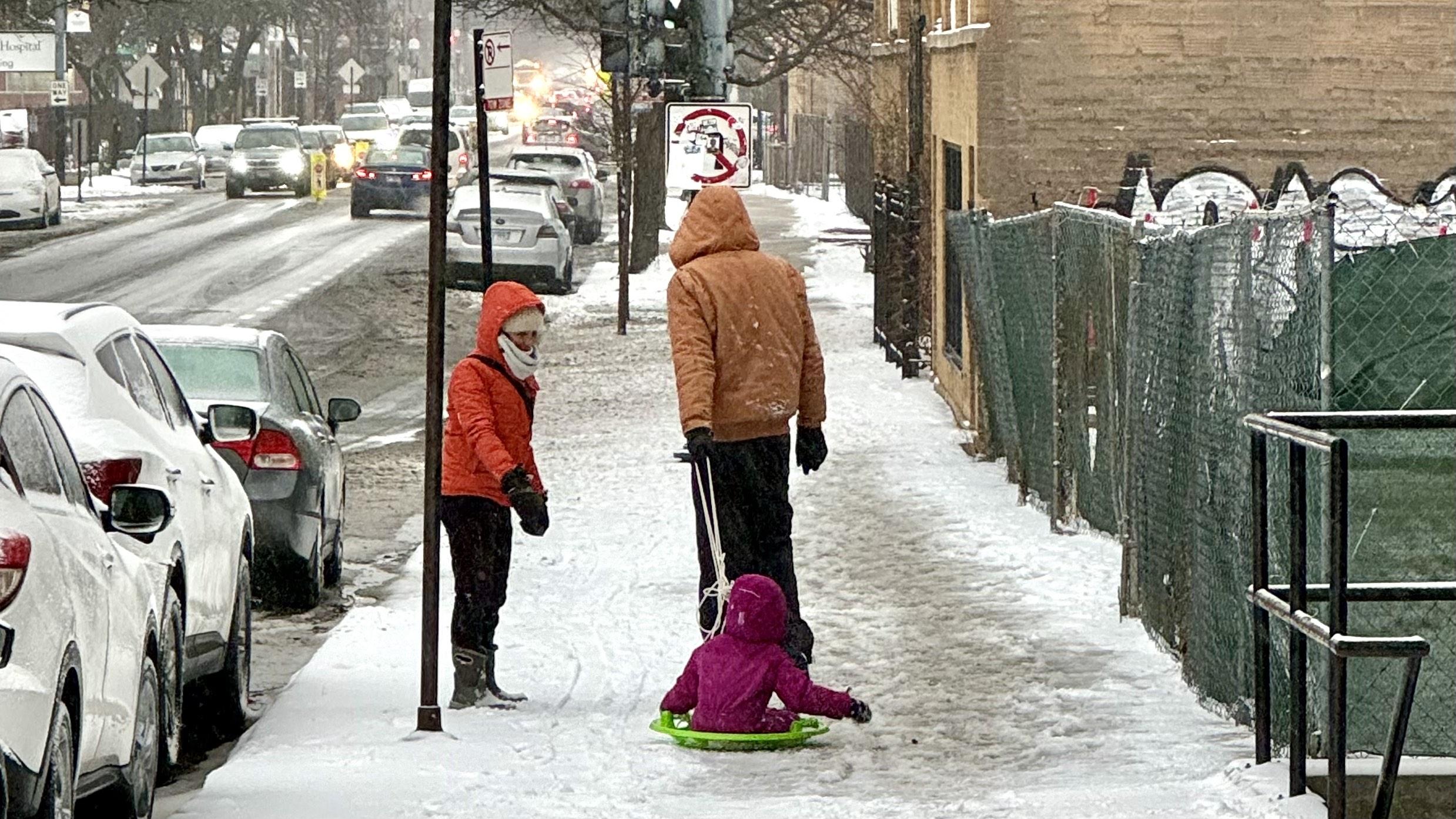 Chicagoans made the most of the season’s big “snowstorm” in February, which dropped less than 3 inches on the city in one of the least snowy winters. (Patty Wetli / WTTW News) Chicagoans made the most of the season’s big “snowstorm” in February, which dropped less than 3 inches on the city in one of the least snowy winters. (Patty Wetli / WTTW News)