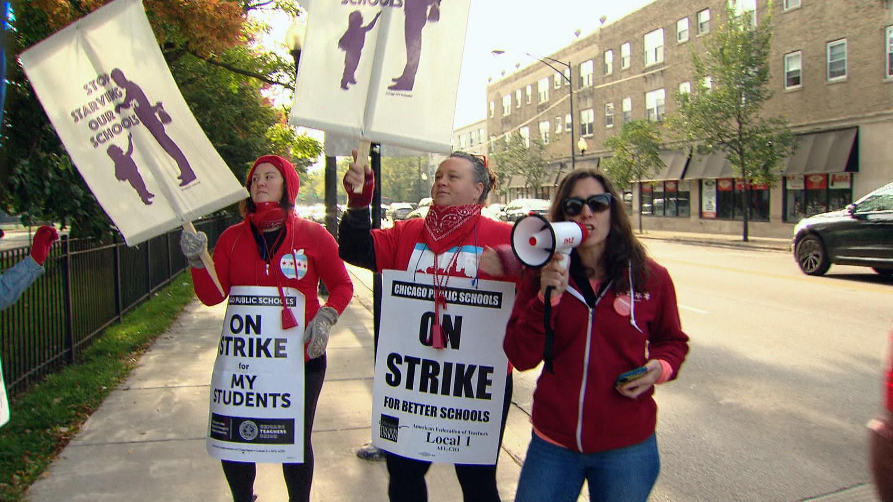 Teachers rallied Friday outside of Chicago schools and downtown as their strike continued for a second day. 