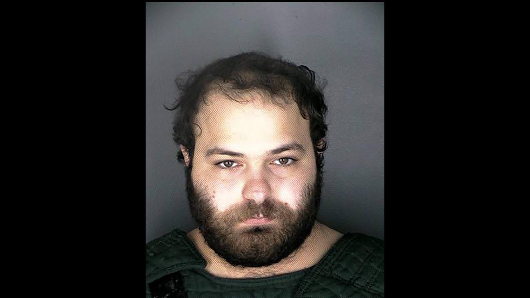 This undated photo provided by the Boulder Police Department shows Colorado shooting suspect Ahmad Al Aliwi Alissa. Alissa has been identified as the suspect in Monday, March 22, 2021 shooting rampage at a grocery store in Boulder. (Boulder Police Department via AP)