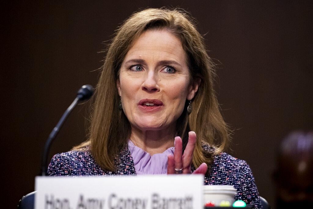 Supreme Court nominee Amy Coney Barrett speaks during a confirmation hearing before the Senate Judiciary Committee, Wednesday, Oct. 14, 2020, on Capitol Hill in Washington. (Michael Reynolds / Pool via AP)