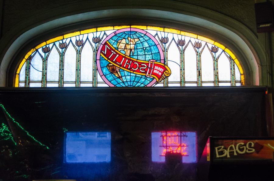 The missing stained glass window as it appeared from inside the bar in recent years. (Courtesy Eric Allix Rogers)