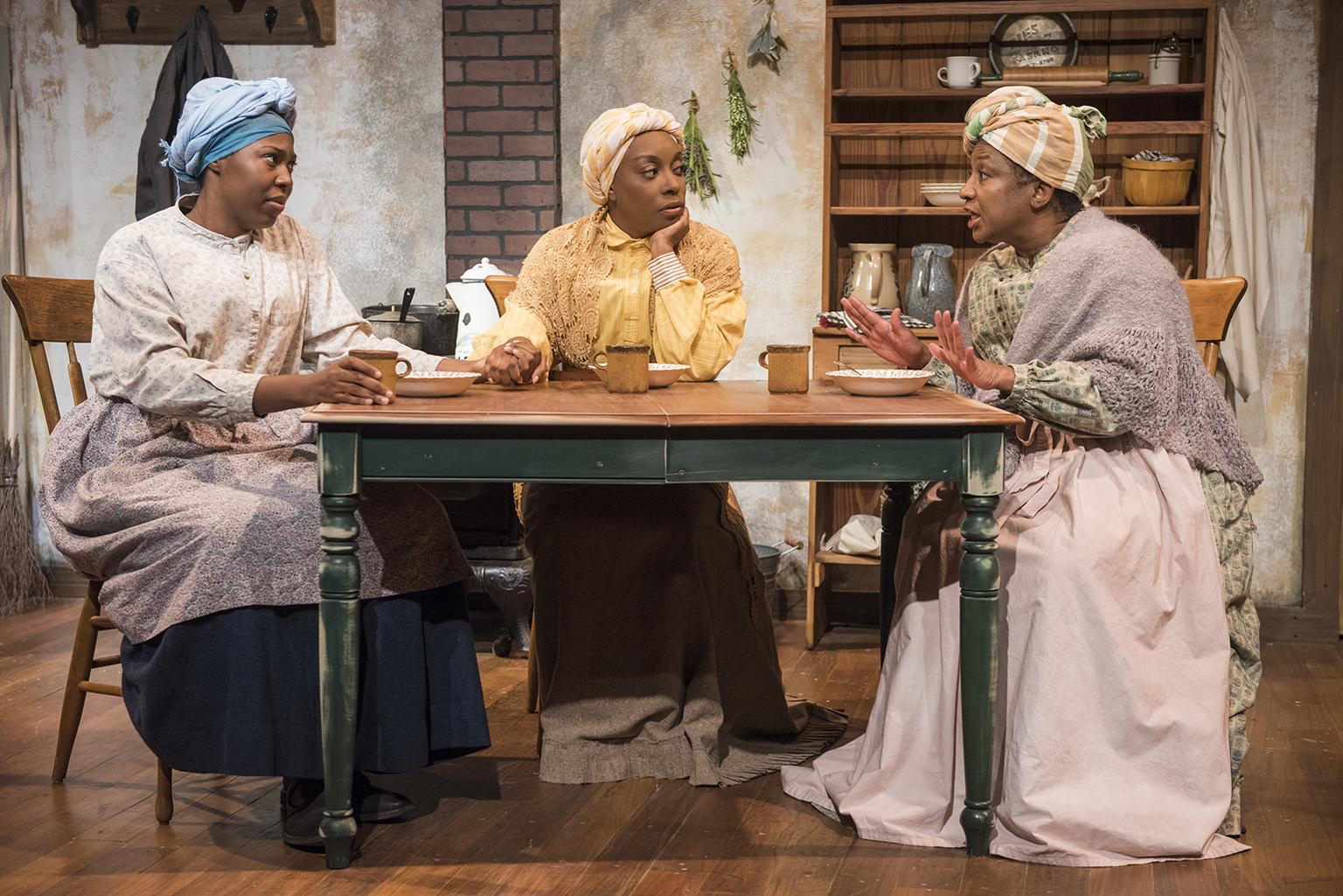 From left: Tiffany Oglesby, Sydney Charles and Joslyn Jones in American Blues Theater’s production of “Flyin’ West.” (Photo by Michael Brosilow)