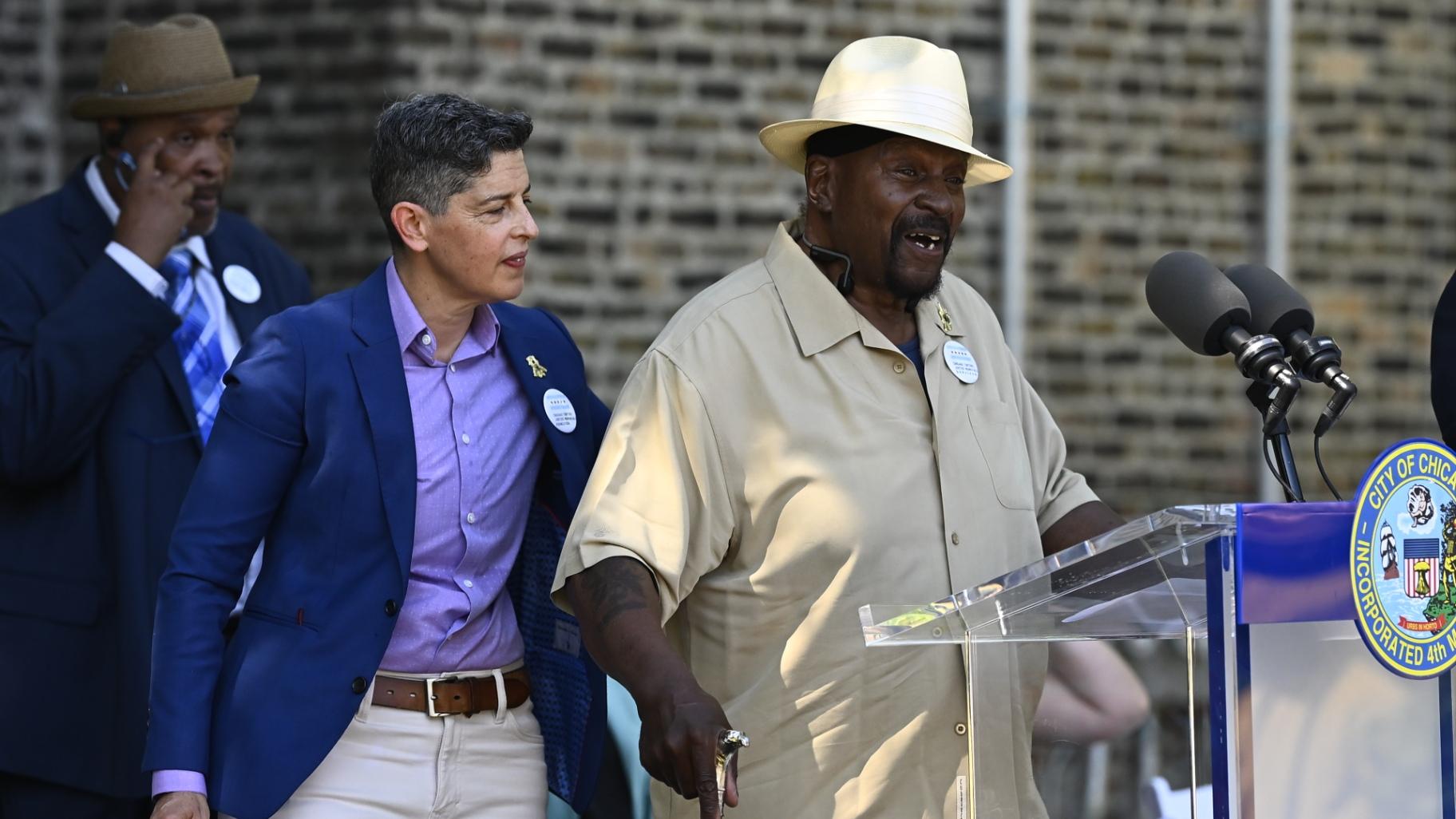 Board president of the Chicago Torture Justice Memorials Foundation and an attorney who represented torture survivors, Joey Mogul, left, and vice president of Chicago Torture Justice Memorials Foundation and police torture survivor Anthony Holmes, right, during a groundbreaking ceremony event on July 8, 2026. (Victor Hilitski / WTTW News)