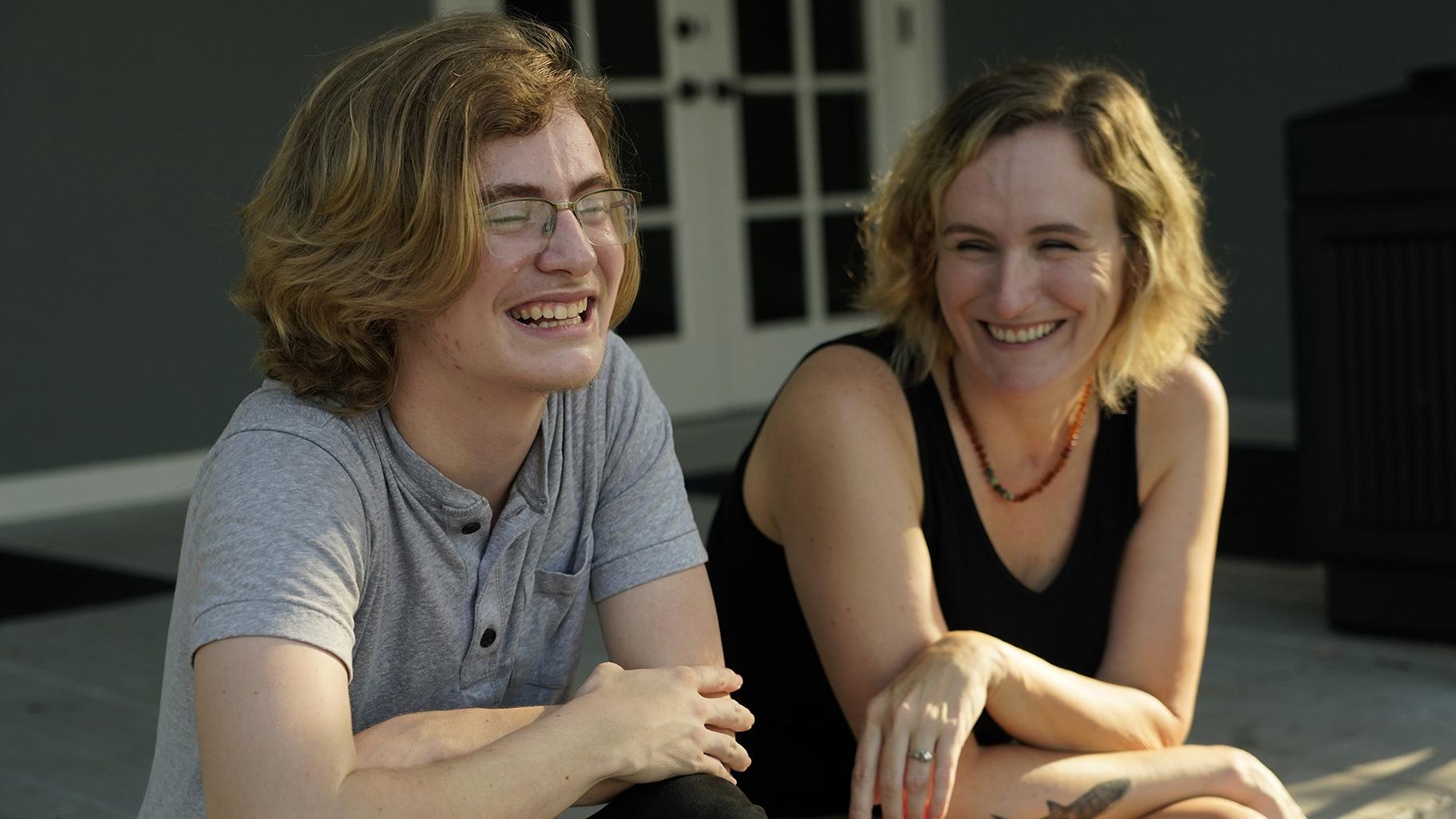 Ray Walker, 17, left, and his mother Katie Rives, share a laugh as they discuss his moving to Virginia for continued gender-affirming care, Wednesday, June 28, 2023, in Madison County, Miss. (AP Photo / Rogelio V. Solis)