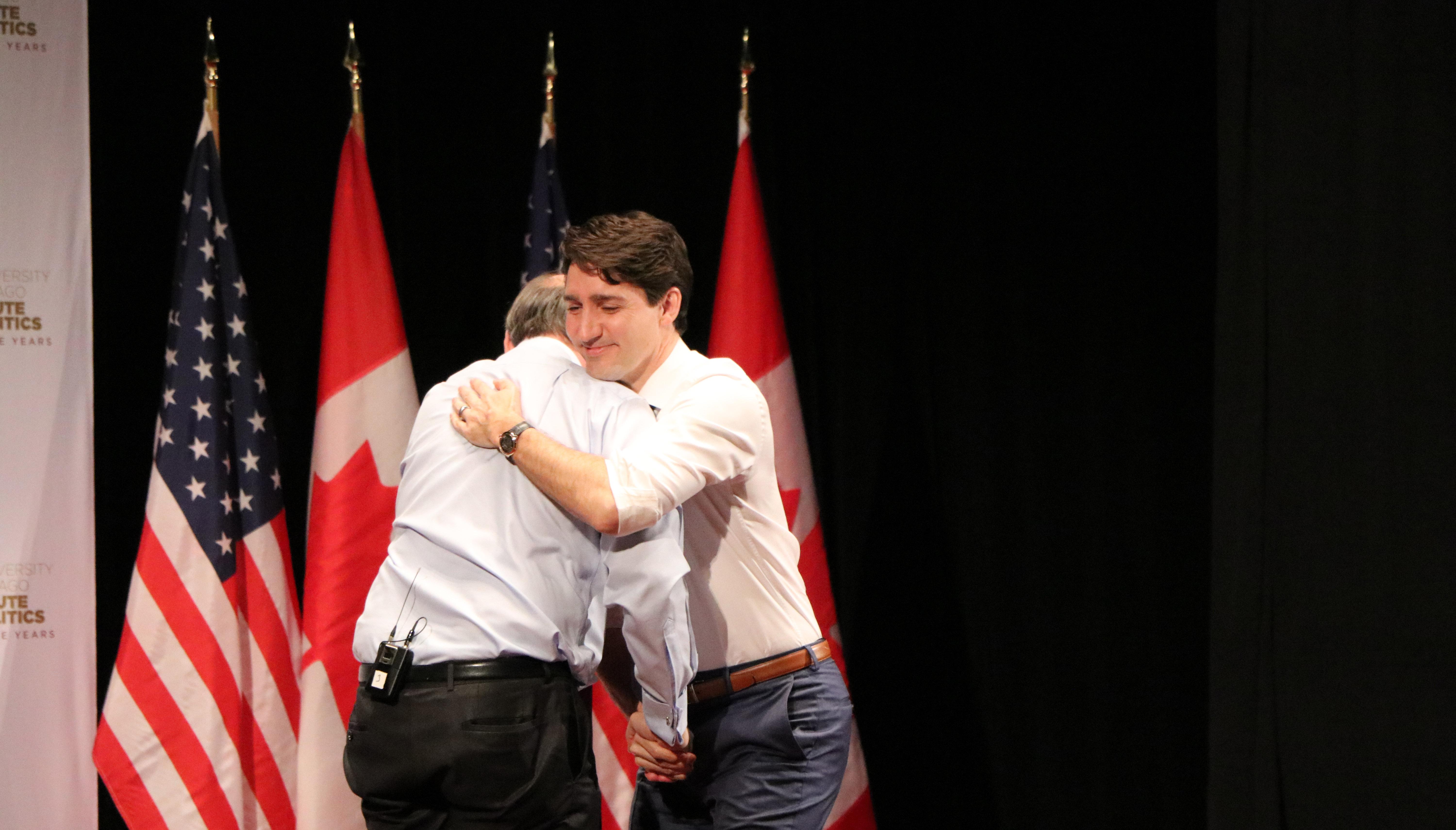Axelrod and Trudeau hug at the end of the question and answer session. (Evan Garcia / Chicago Tonight)