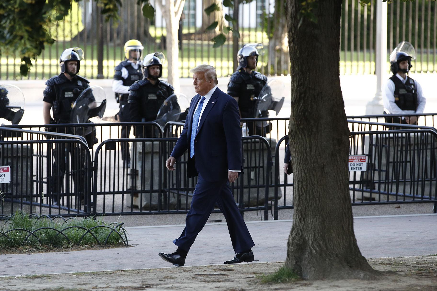 President Donald Trump walks in Lafayette Park to visit outside St. John’s Church across from the White House Monday, June 1, 2020, in Washington. Part of the church was set on fire during protests on Sunday night. (AP Photo / Patrick Semansky)