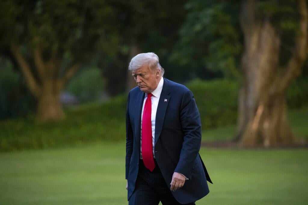 President Donald Trump walks on the South Lawn after arriving on Marine One at the White House, Thursday, June 25, 2020, in Washington. Trump is returning from Wisconsin. (AP Photo / Alex Brandon)