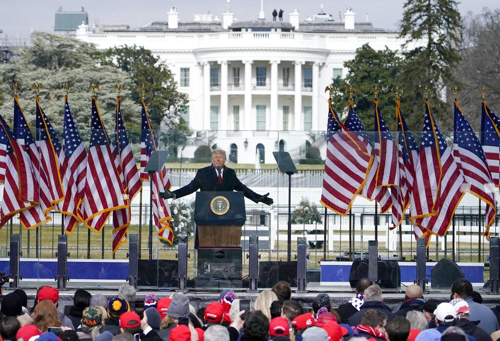 In this Jan. 6, 2021, file photo with the White House in the background, President Donald Trump speaks at a rally in Washington. (AP Photo / Jacquelyn Martin, File)