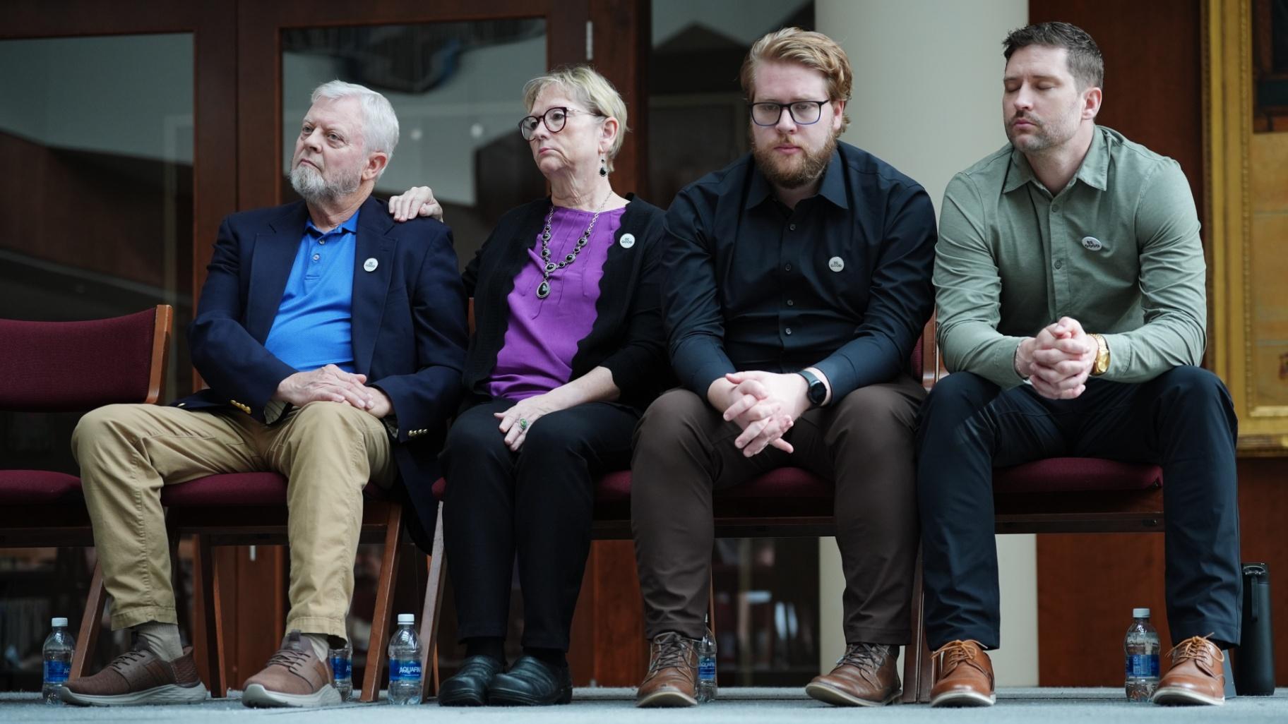 The family of Renee Good, from left; father Tim Ganger, mother Donna Ganger, brother Luke Ganger and brother Brent Ganger, listen during a news conference after the family sued the U.S. government and several immigration officials, Thursday, Oct. 1, 2026, in Minneapolis. (AP Photo / Ellen Schmidt)