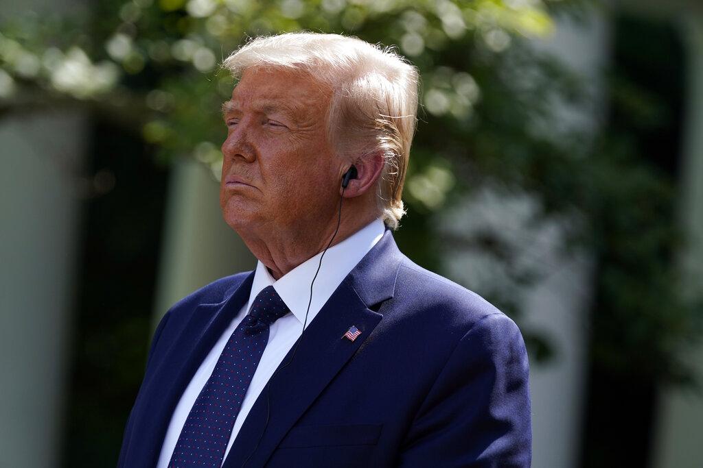 President Donald Trump listens as Mexican President Andres Manuel Lopez Obrador speaks during an event in the Rose Garden at the White House, Wednesday, July 8, 2020, in Washington. (AP Photo / Evan Vucci)