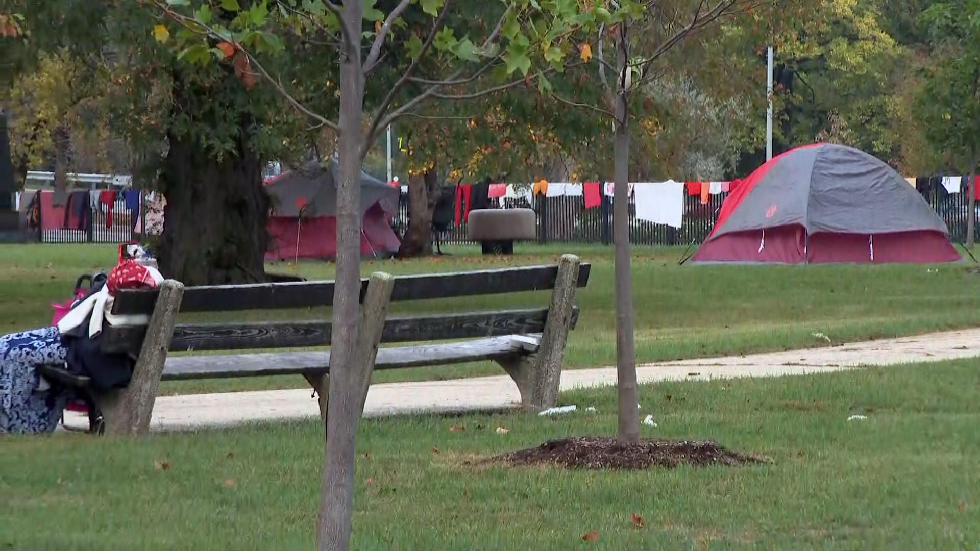 Across from where a luxury apartment building is planned in Uptown are several homeless camps.  (WTTW News)