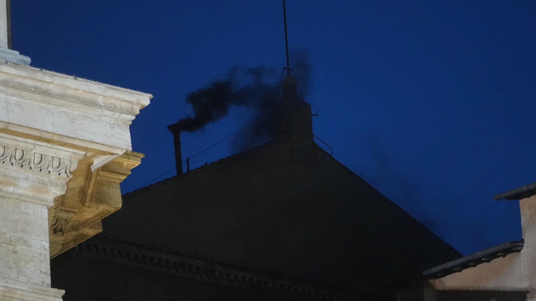 Black smoke billows from the chimney of the Sistine Chapel during the cardinals' conclave to elect a new pope, at the Vatican, Wednesday, May 7, 2025. (AP Photo / Alessandra Tarantino)