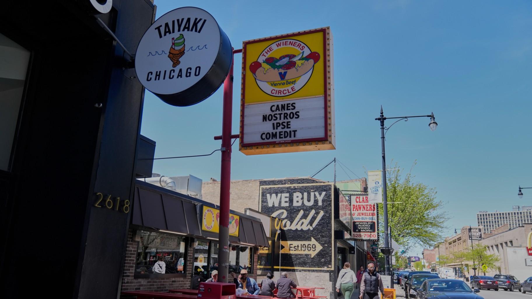 The Wiener's Circle, an iconic hot dog stand known for posting quirky phrases on its sign, posted on Instagram that its current sign translates to &quot;He has eaten our dogs,&quot; Friday, May 9, 2025, in Chicago. (AP Photo / Erin Hooley)