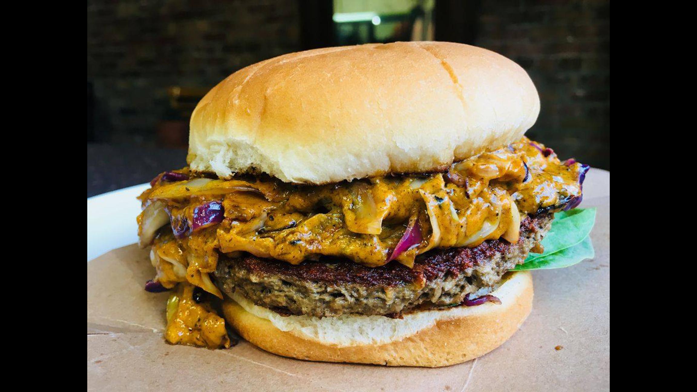 Vegan soul food restaurant B’Gabs Goodies brings its Jamaican jerk and coconut curry burger to Vegandale this weekend. (Vegandale Food Drink Festival / Facebook)