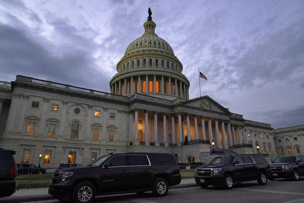 Dusk falls over the Capitol, Monday, Dec. 21, 2020, in Washington. (AP Photo /Jacquelyn Martin)