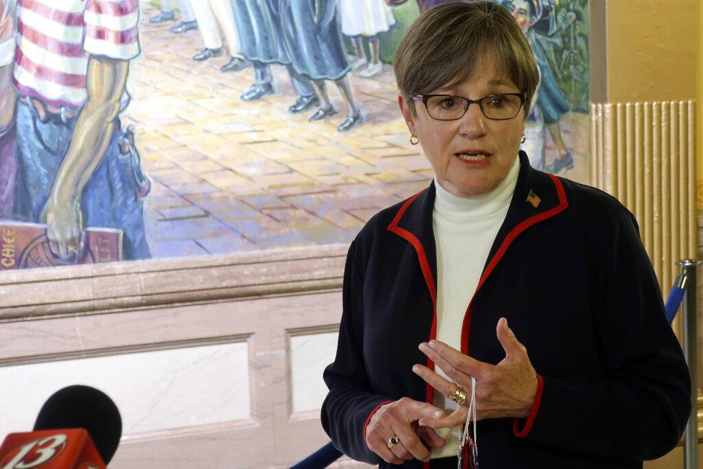 Kansas Gov. Laura Kelly answers questions from reporters about the coronavirus pandemic after a meeting with legislative leaders, Thursday, July 2, 2020, at the Statehouse in Topeka, Kan. (AP Photo / John Hanna)