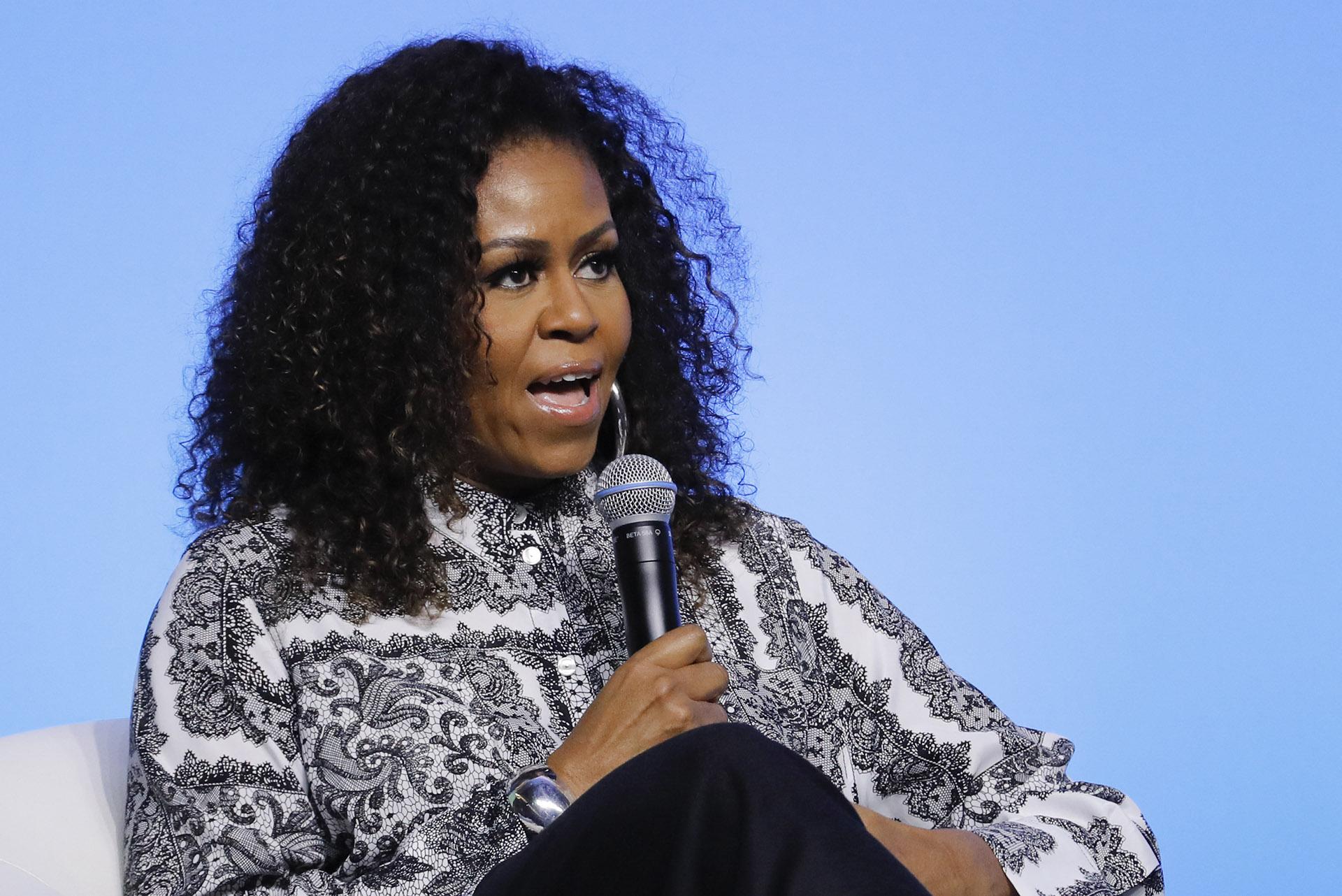 In this Dec. 12, 2019, file photo, former U.S. first lady Michelle Obama speaks during an event for Obama Foundation in Kuala Lumpur, Malaysia. (AP Photo / Vincent Thian, File)