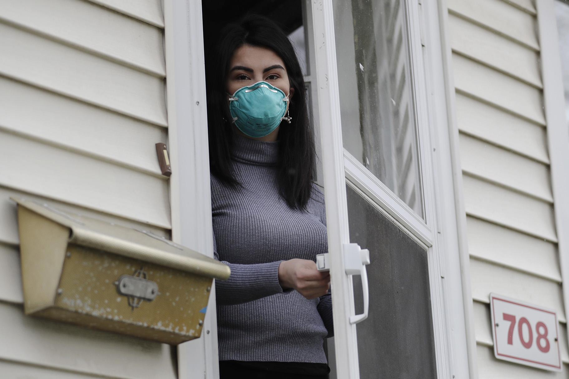 Francy Sandoval poses for a portrait at her home in Melrose Park, Ill., Thursday, April 23, 2020.(AP Photo / Nam Y. Huh)