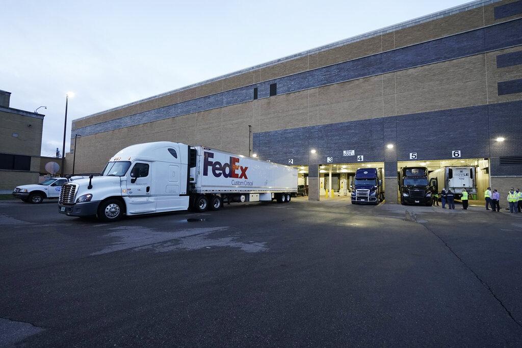 A truck loaded with the Pfizer-BioNTech COVID-19 vaccine leaves the Pfizer Global Supply Kalamazoo manufacturing plant in Portage, Mich., Sunday, Dec. 13, 2020. (AP Photo / Morry Gash, Pool)