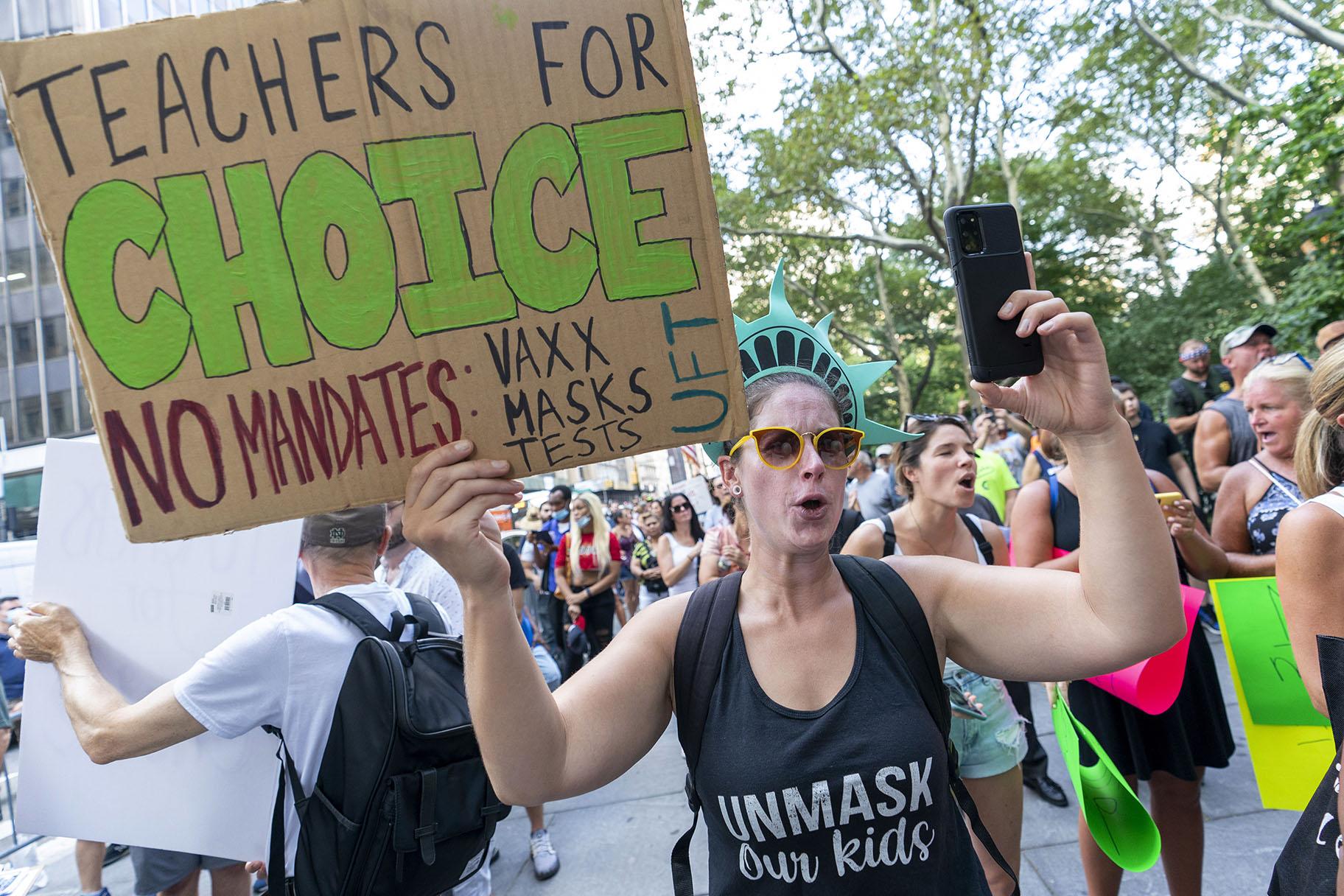 Teachers rally at a demonstration against COVID-19 vaccination mandates, Wednesday, Aug. 25, 2021, in New York. (AP Photo / Mary Altaffer)