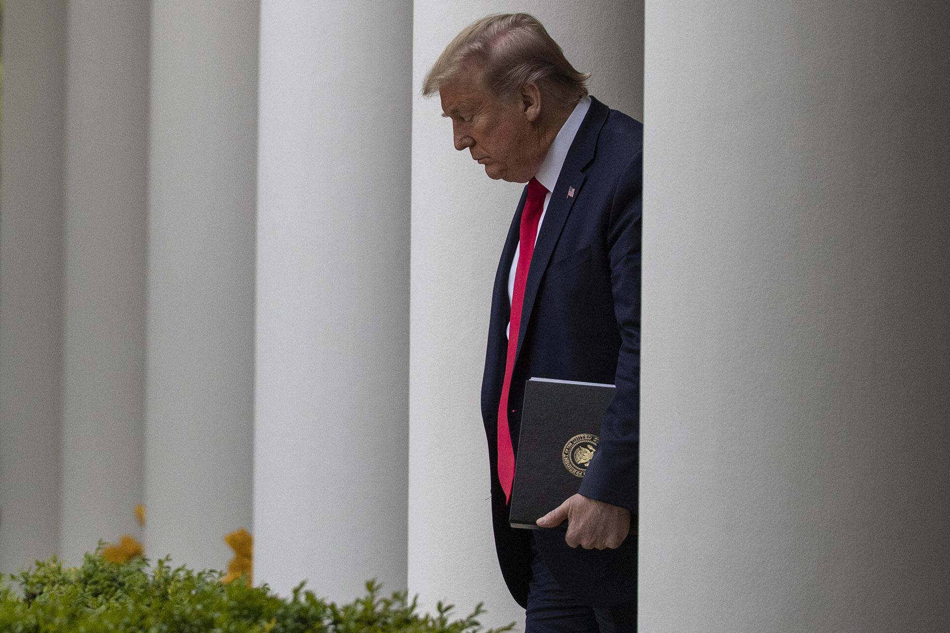 President Donald Trump arrives to speak about the coronavirus in the Rose Garden of the White House, Tuesday, April 14, 2020, in Washington. (AP Photo / Alex Brandon)