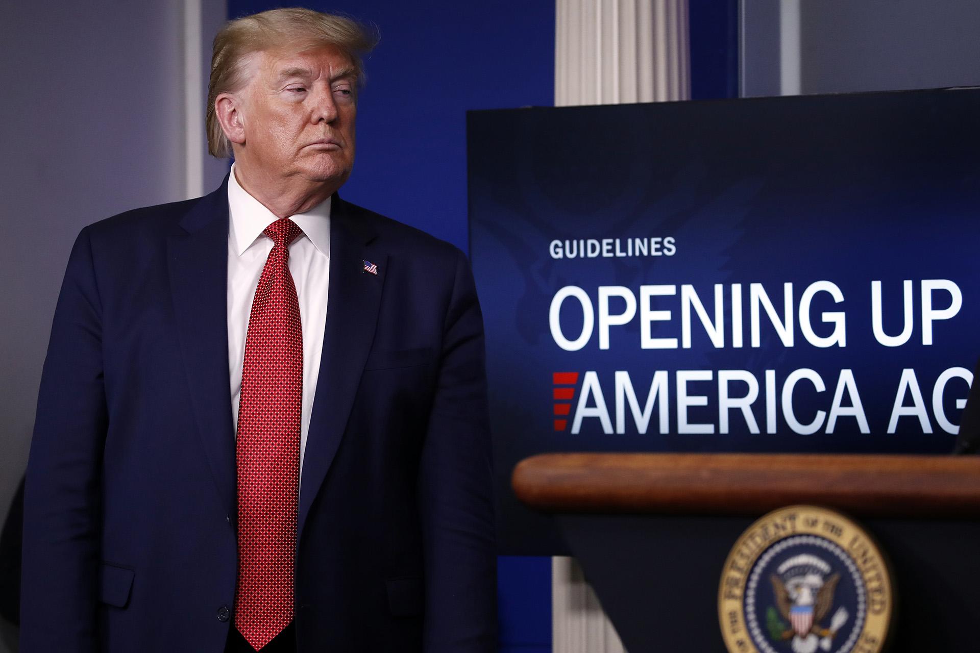 President Donald Trump listens during a briefing about the coronavirus in the James Brady Press Briefing Room of the White House, Thursday, April 16, 2020, in Washington. (AP Photo / Alex Brandon)